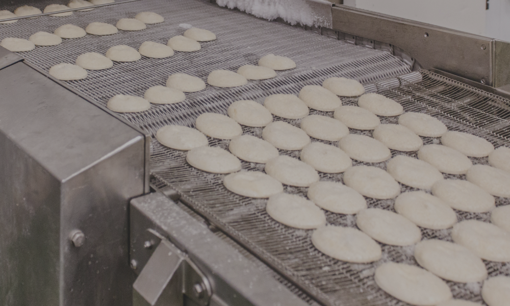 Food Manufacturer Boosts First Pass Quality & Cuts Scrap with Management Systems
